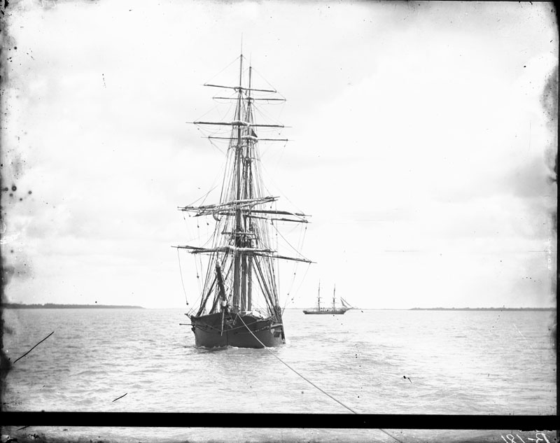 Ship and Brig. George François Mugnier, c. 1880–1920. Collodion on glass plate, 8 x 10 inches. Louisiana State Museum 09813.0180.