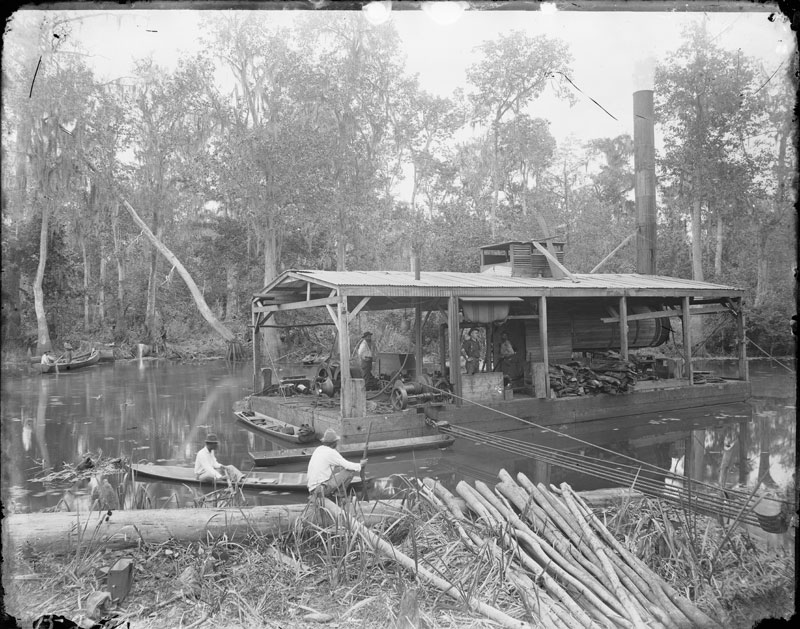 Floating Sawmill. George François Mugnier, c. 1880–1920. Collodion on glass plate, 8 x 10 inches. Louisiana State Museum 09813.0274.