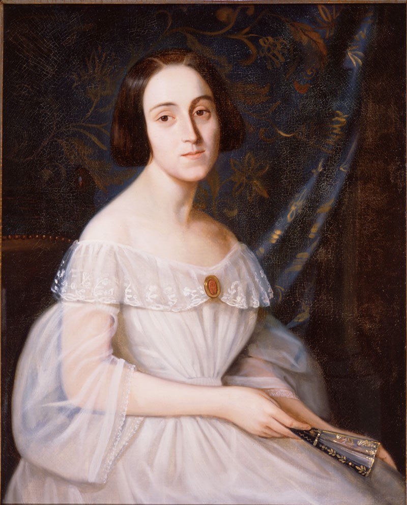 Mrs. Victor DeJan née Clara Abat. Adolphe Rinck, 1841. Oil on canvas, 32 x 26 inches. Signed upper right in red paint, “Rinck 1841.” Gift of Mrs. Victor Dejan. Louisiana State Museum 09864.03.