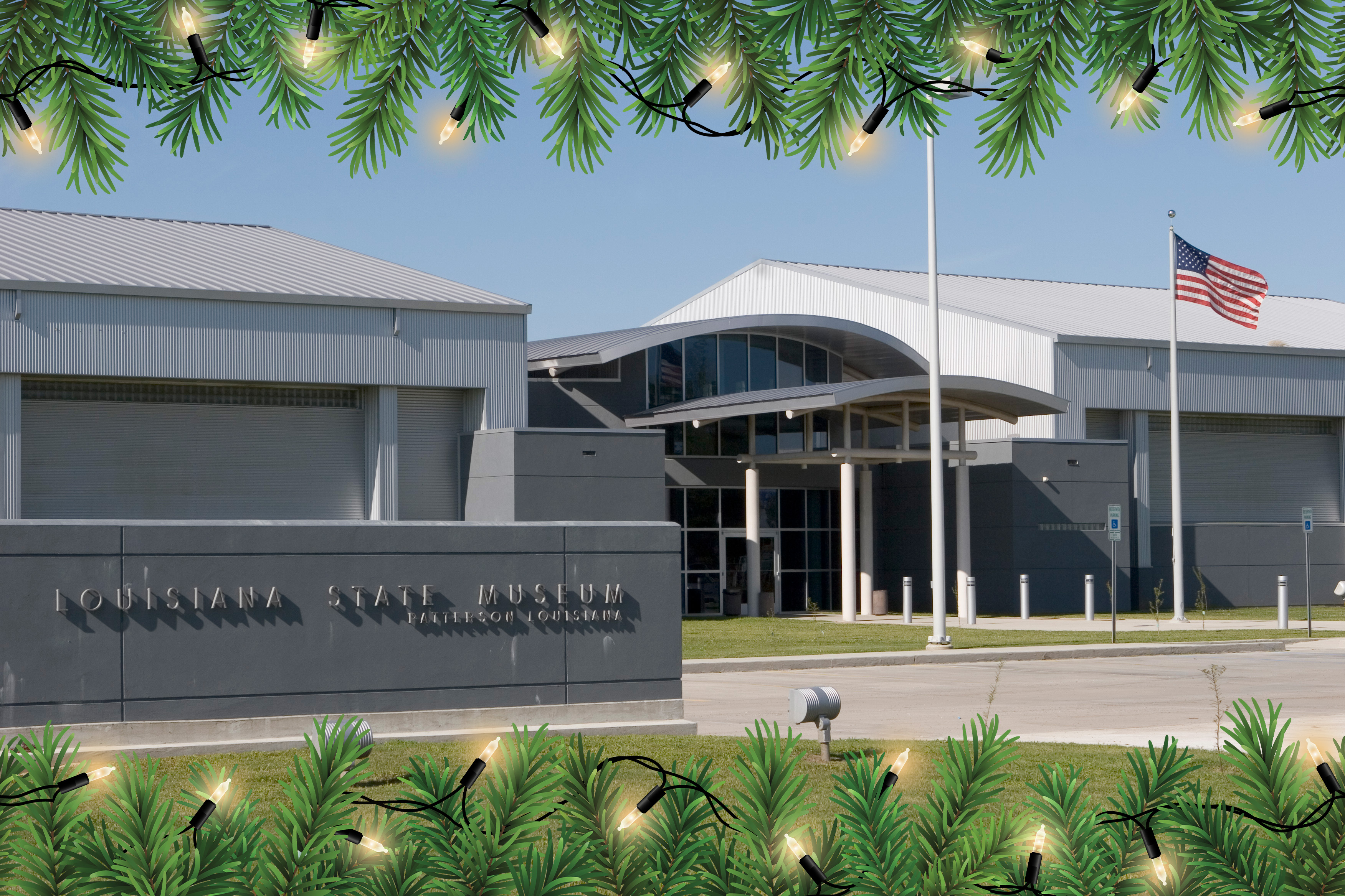Exterior view of the Wedell-Williams Aviation & Cypress Sawmill Museum in Patterson, Louisiana, on a sunny day. The modern gray building features a curved entrance canopy, tall windows, and an American flag on a pole to the right. The image is framed at the top and bottom with illustrated green pine branches and glowing holiday string lights.