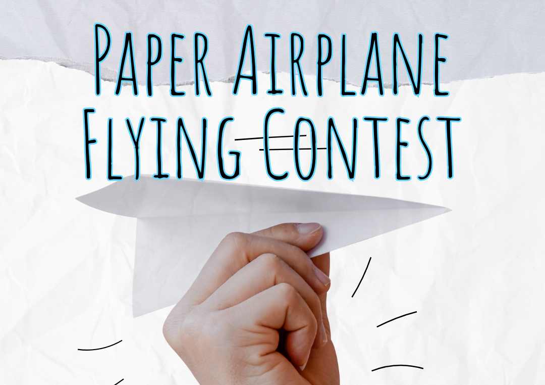 Promotional graphic reading “Paper Airplane Flying Contest” in large blue-outlined text over a light, textured background. A hand in the foreground holds a folded white paper airplane, angled as if about to launch, with simple line accents suggesting motion.