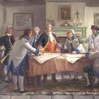 Painting of Bernardo de Gálvez and his officers gathered around a large table during a war council (Junta de Guerra) in July 1779. Gálvez, in a red and gold uniform, stands at the center directing discussion as maps are spread before them.