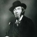 Black-and-white portrait of a bearded man wearing a dark coat, wide-brimmed hat, and bow tie, seated and holding a cane. The image shows poet Walt Whitman in his younger years, gazing calmly at the camera.