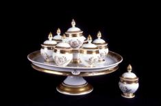 Pots de crème set used on a Louisiana plantation. French, ca. 1820. Porcelain. Gift of the Friends of the Cabildo, Louisiana State Museum 1983.1.2.