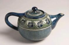 Teapot with incised decoration, 1906. Newcomb Pottery. Louisiana State Museum 1975.001.51 a-b.