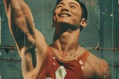 Poster for the documentary The Ragin’ 13. The image shows a victorious weightlifter in a red singlet featuring a large white fleur-de-lis, holding a trophy high overhead. His face is lit with pride and determination. The background is textured in warm tones, with laurels along the bottom noting multiple film festival awards. Text at the top reads “The Ragin’ 13.”