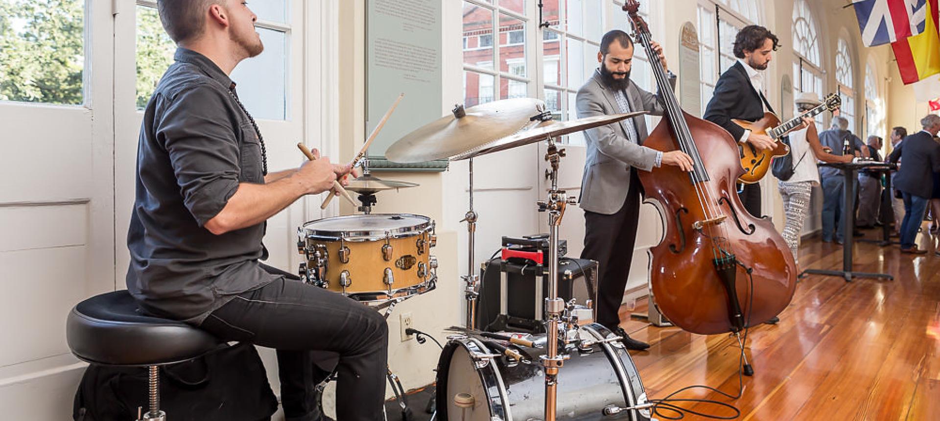 Band plays at the grand opening of the We Love You, New Orleans exhibition at the Cabildo on Jackson Square