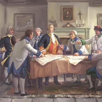 Painting of Bernardo de Gálvez and his officers gathered around a large table during a war council (Junta de Guerra) in July 1779. Gálvez, in a red and gold uniform, stands at the center directing discussion as maps are spread before them.